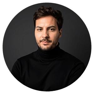 Man in black turtleneck, serious expression